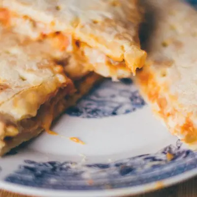 Golden folded calzone on a plate