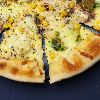 Vegetable pizza with corn and peppers