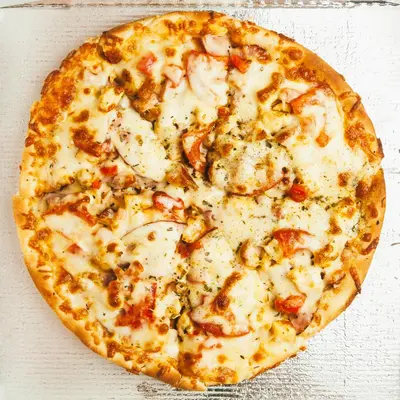 Margherita pizza with melted mozzarella